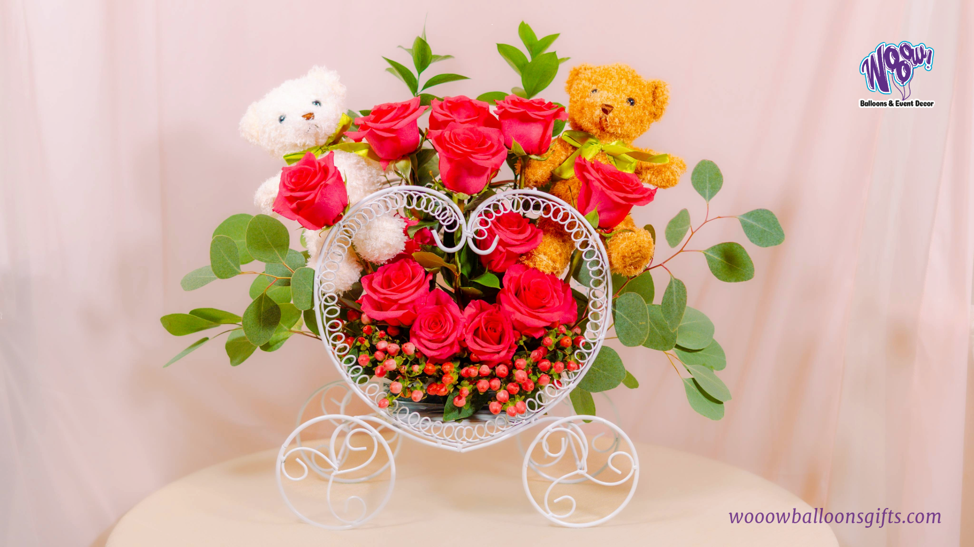 Teddy Bear Love Carriage with fresh red roses and plush teddy bears in a romantic white metal carriage.