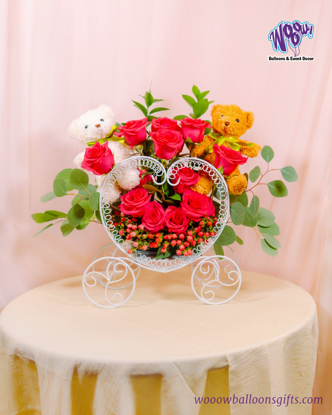 Teddy Bear Love Carriage with fresh red roses and plush teddy bears in a romantic white metal carriage.