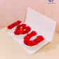 Love Letters Rose Box with fresh red roses and Ferrero Rocher chocolates in a luxury white box.