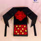 Valentine’s Day Roses & Chocolate Gift Set – fresh red roses and Ferrero Rocher chocolates in a luxury black box.