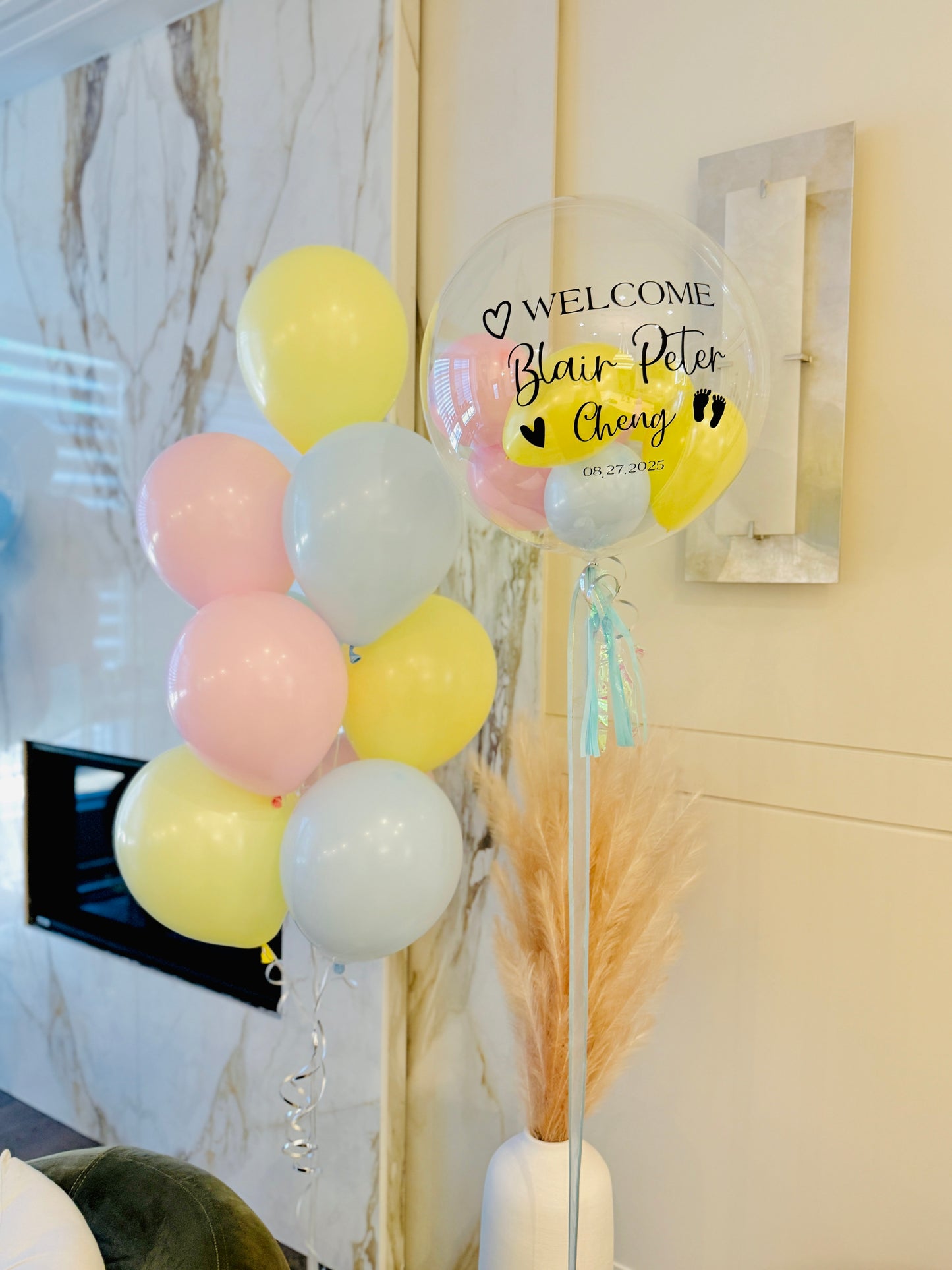 Decorative balloons with a personalized message with a mix of latex for new born in Toronto.
