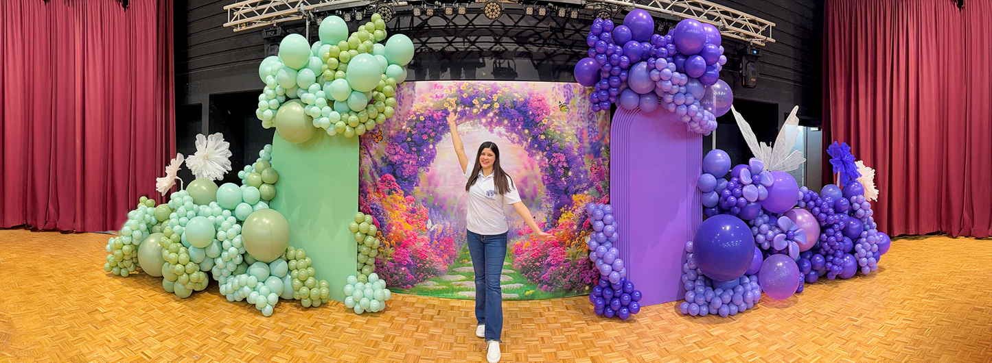 Whimsical Balloon Decoration Set-up. This full-service package includes custom backdrops, balloon garlands, giant flower decorations.