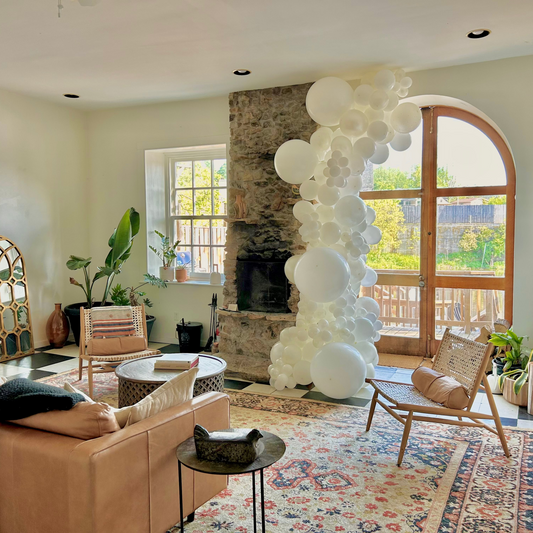 Elegant organic balloon garland in white, designed for luxury home décor, weddings, and stylish event setups.