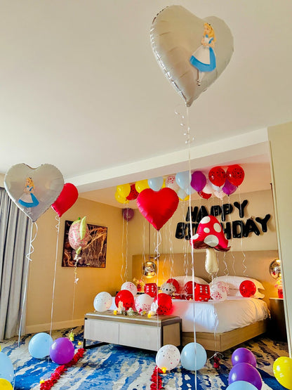 Wonderland birthday decor with mushrooms and teapot balloons