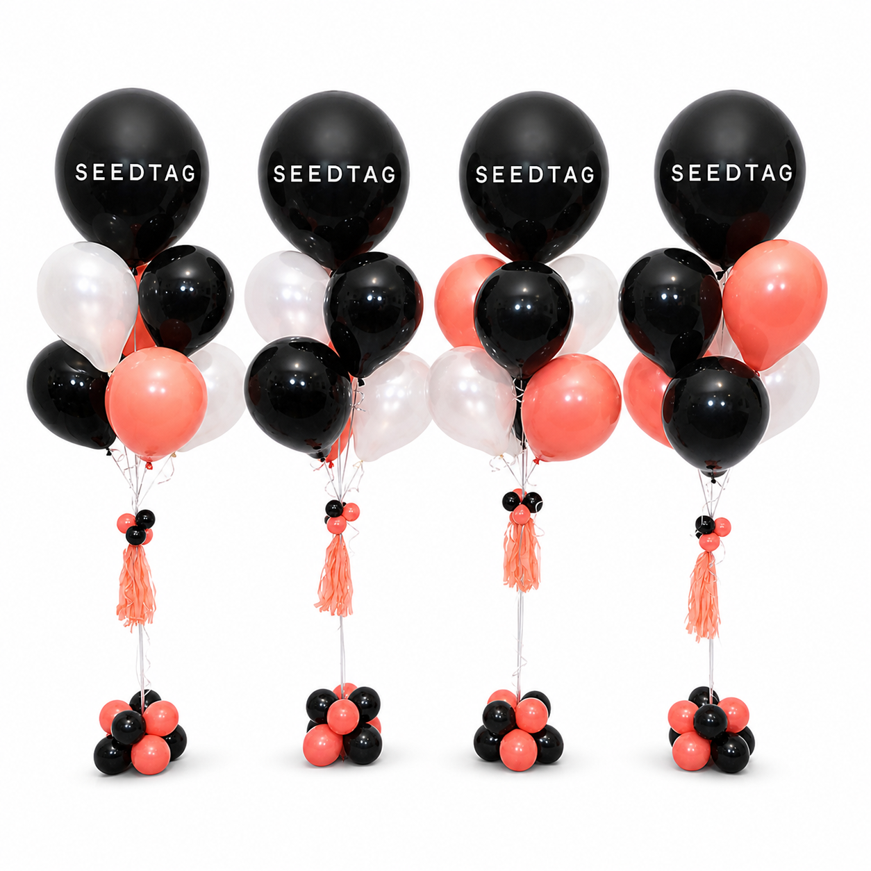Seedtag branded balloon bouquets in black, coral and white for corporate event branding and balloon decor in Toronto GTA by Wooow Balloons