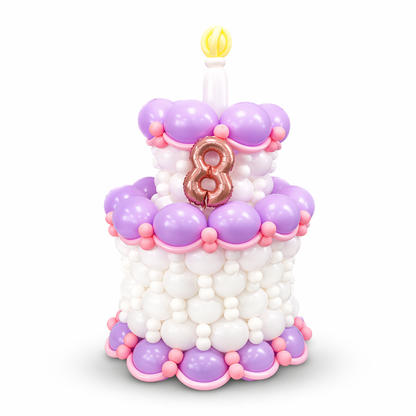 Custom balloon cake centerpiece with personalized number, pastel purple and pink balloon design for birthday celebrations in Toronto