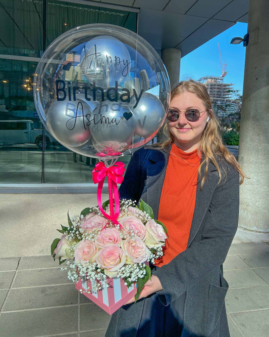 Luxury balloon and flower box birthday gift Toronto – pink roses arrangement with personalized clear bubble balloon by Wooow Balloons
