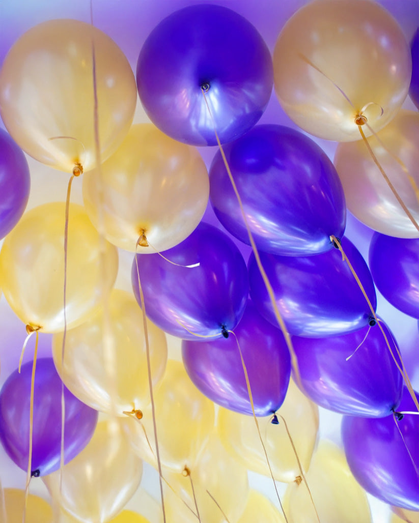 Ceiling Balloons Toronto – elegant gold and purple helium balloon ceiling decoration for birthdays, weddings, and events by Wooow Balloons