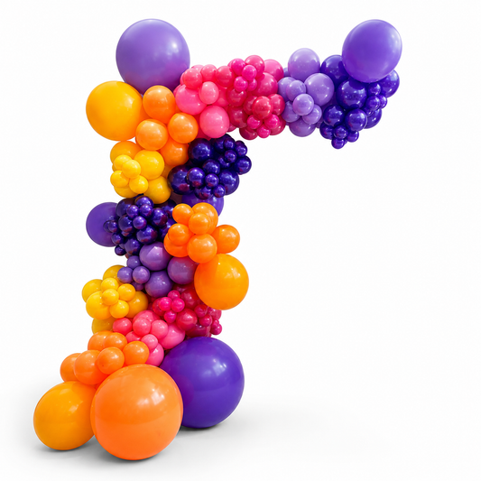 Luxury colorful balloon garland arch in orange, pink, and purple tones for event decor in Toronto by Wooow Balloons
