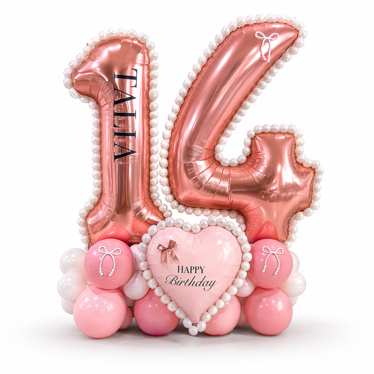 Coquette style rose gold balloon number display with pearl details and heart balloon, elegant birthday balloon decor setup in Toronto