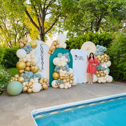 Custom graduation decor installation with premium balloon garlands and backdrop panels