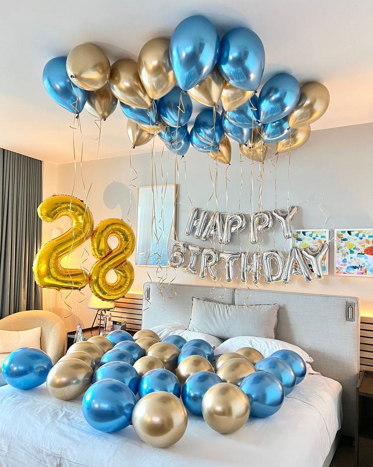 Cute blue and gold birthday hotel room decoration with Happy Birthday balloons and number 28 by Wooow Balloons Toronto