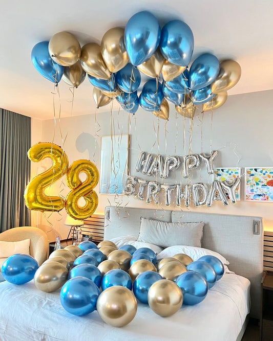Cute blue and gold birthday hotel room decoration with Happy Birthday balloons and number 28 by Wooow Balloons Toronto