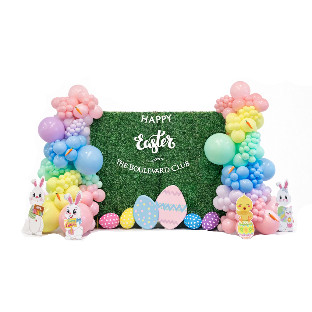 Luxury Easter balloon backdrop with pastel balloon garlands, green hedge wall, bunny and egg props, perfect for spring events, photo booths, and Easter party decor in Toronto and GTA.