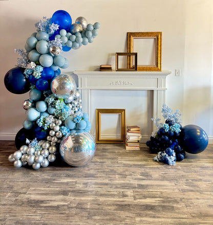 Freestanding balloon garland in custom colours with floral accents and metallic Orbz by Wooow Balloons Toronto.