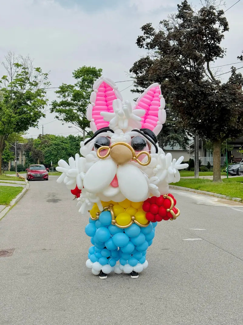 Giant White Rabbit balloon costume inspired by Alice in Wonderland for themed events in Toronto
