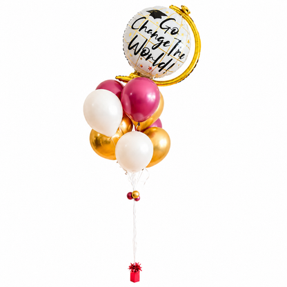 Go Change The World graduation balloon bouquet with gold white and fuchsia helium balloons