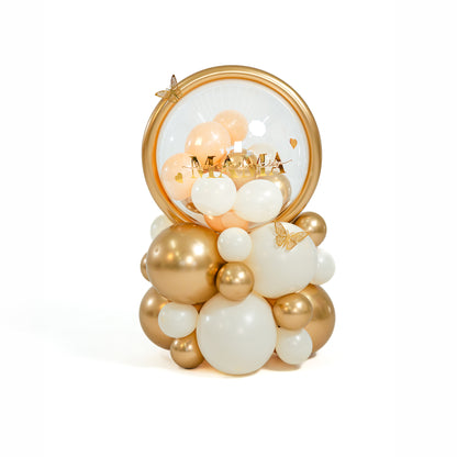 Gold and ivory Mother’s Day balloon arrangement with luxury organic styling in Toronto