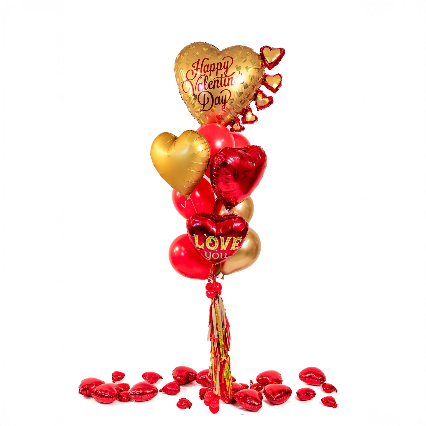 Golden heart Valentine balloon bouquet in red and gold, styled for a romantic surprise