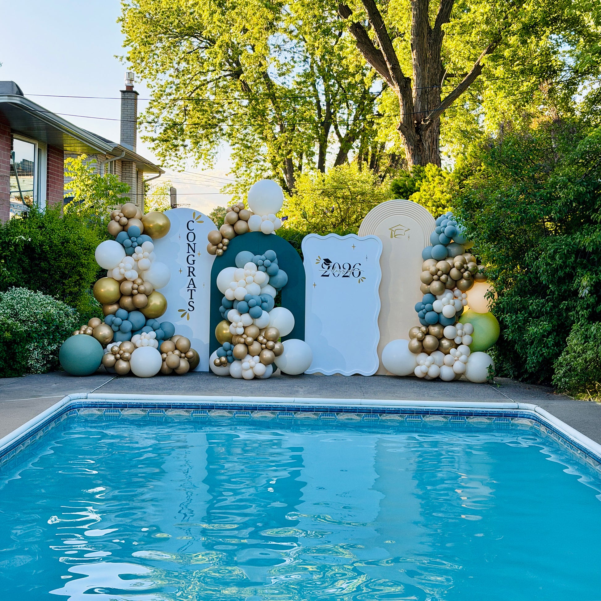 Graduation backdrop rental Toronto with luxury balloon garlands and custom panels