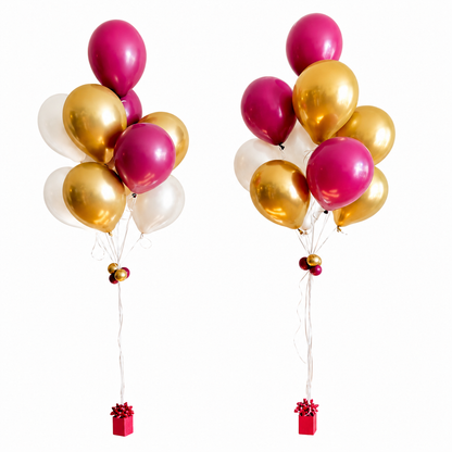 Graduation helium balloon bouquets Toronto featuring gold white and fuchsia balloons with gift box weights