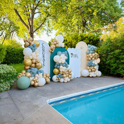 Graduation party backdrop rental with white gold and sage balloon decor