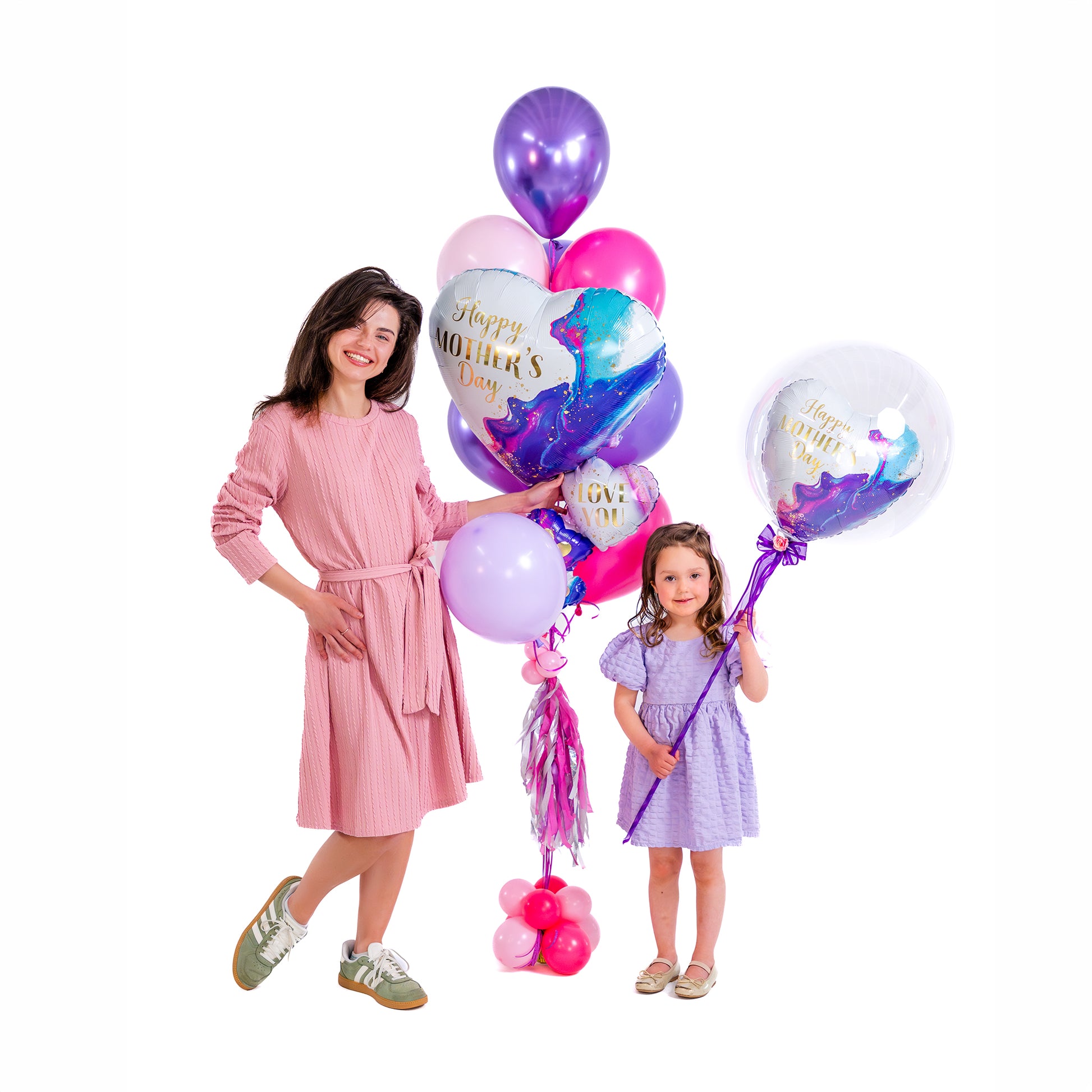 Mother and daughter celebrating with Mother’s Day heart balloon bouquet delivery in Toronto