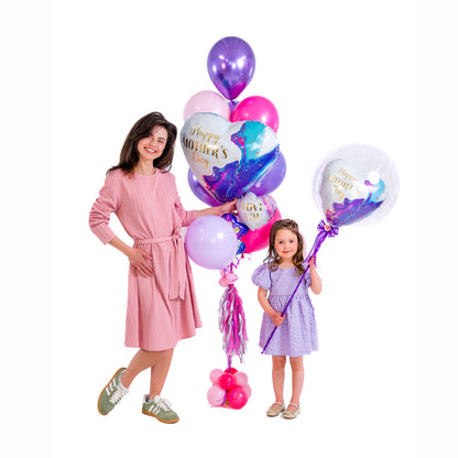 Mother and daughter celebrating with Mother’s Day heart balloon bouquet delivery in Toronto