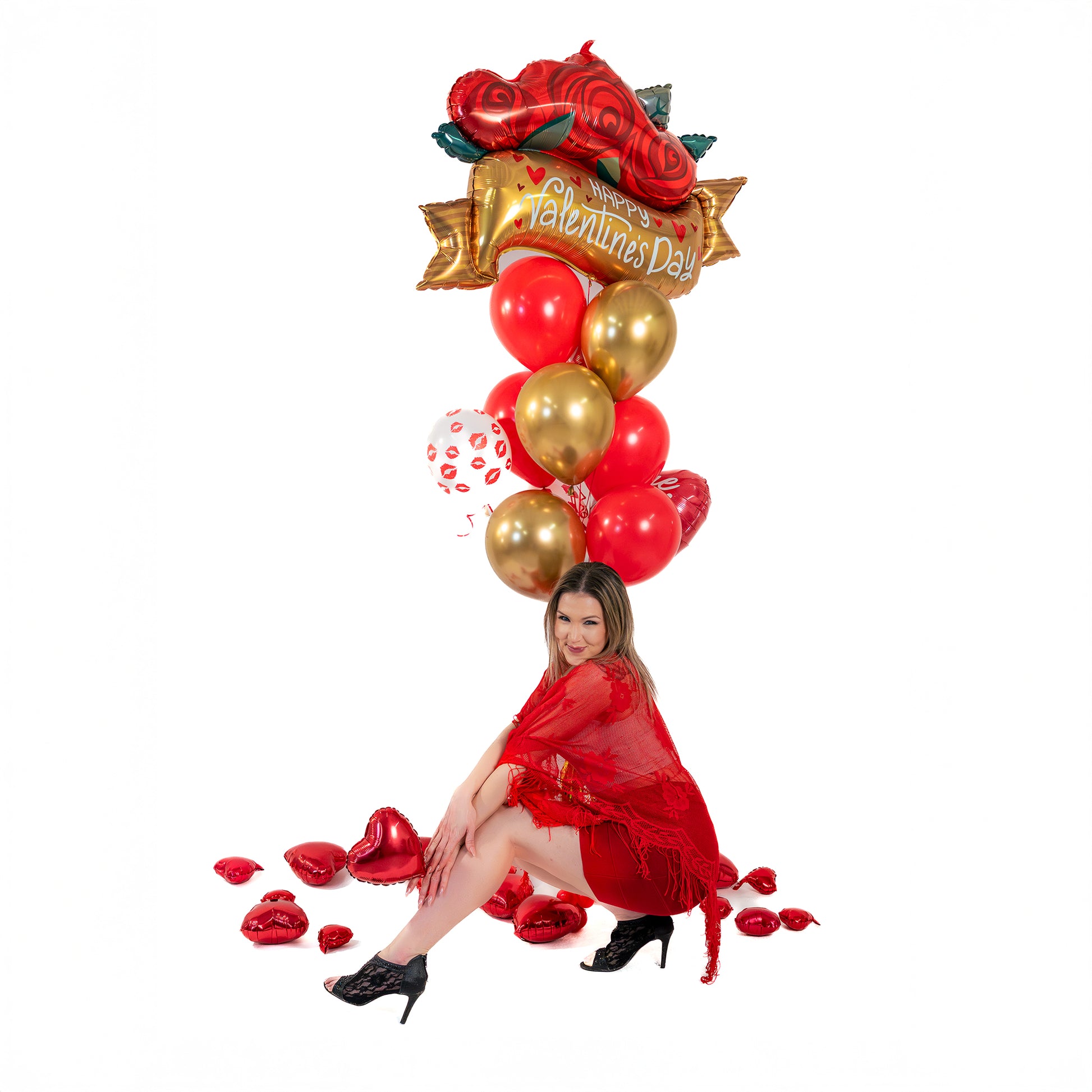 Valentine balloon bouquet Toronto with heart foil balloons and kiss-print accent balloon