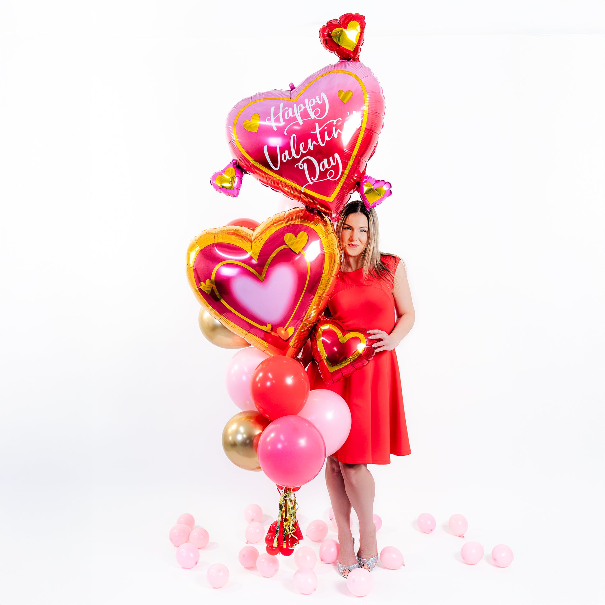 Heart balloons Toronto Valentine’s Day bouquet with helium balloons, gold accents and handmade tassels