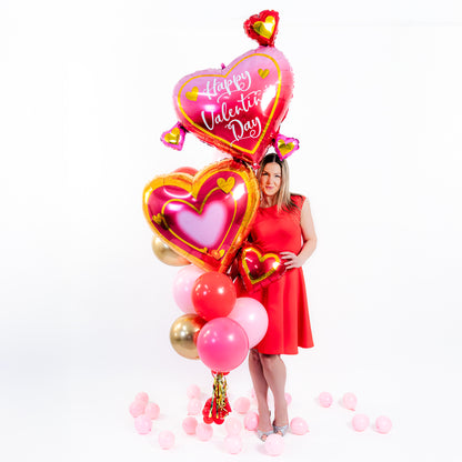 Heart balloons Toronto Valentine’s Day bouquet with helium balloons, gold accents and handmade tassels