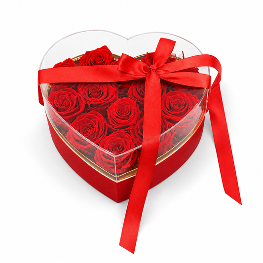 Heart-shaped box with red roses and ribbon, luxury rose gift arrangement for delivery in Toronto