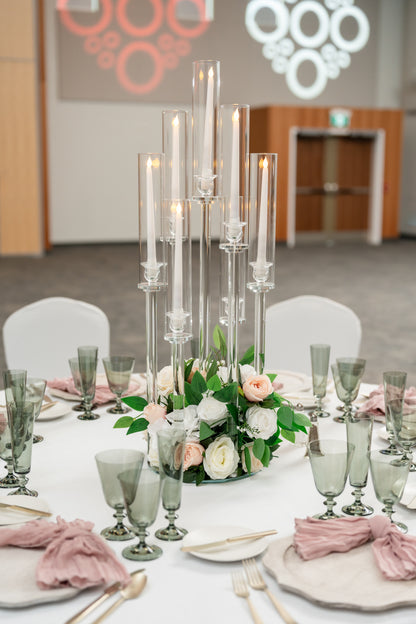 Elegant wedding decor including floral arrangements, centerpieces, and lighting installations by Wooow Balloons.