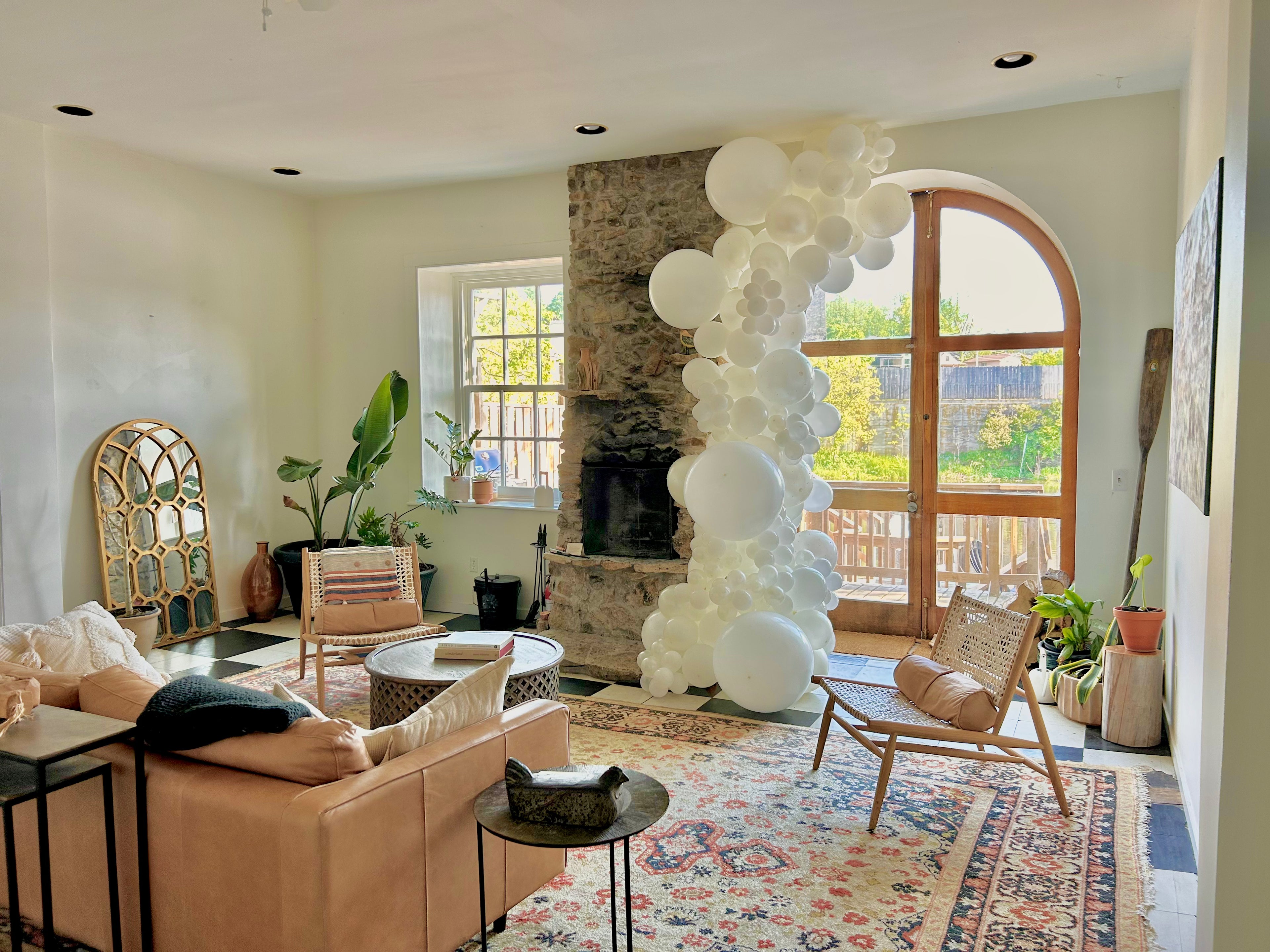 Elegant organic balloon garland in white, designed for luxury home décor, weddings, and stylish event setups.