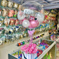 Bloom Box featuring roses, baby’s breath, and a clear customizable bobo balloon