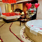 Love balloon setup with roses and lights for romantic celebrations in Toronto.