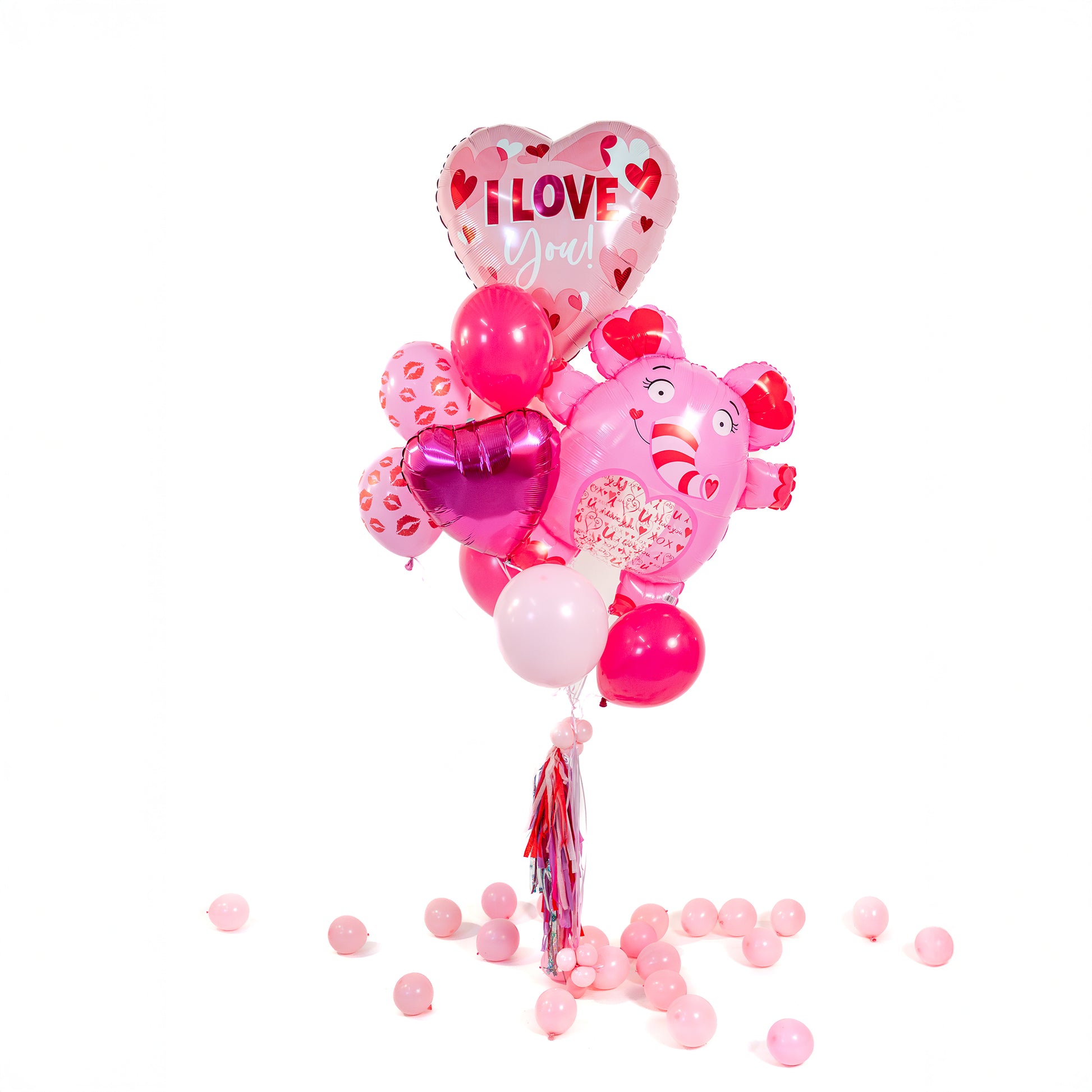 Close-up of Love Elephant Valentine Balloon Bouquet in Toronto with I Love You heart balloon, elephant character balloon, heart foil and latex balloons.
