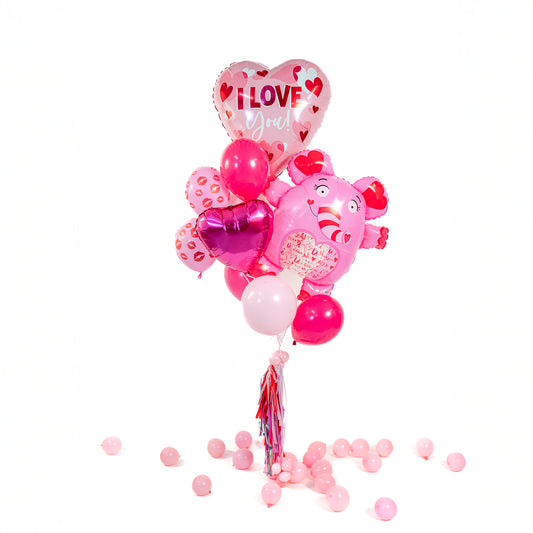 Close-up of Love Elephant Valentine Balloon Bouquet in Toronto with I Love You heart balloon, elephant character balloon, heart foil and latex balloons.