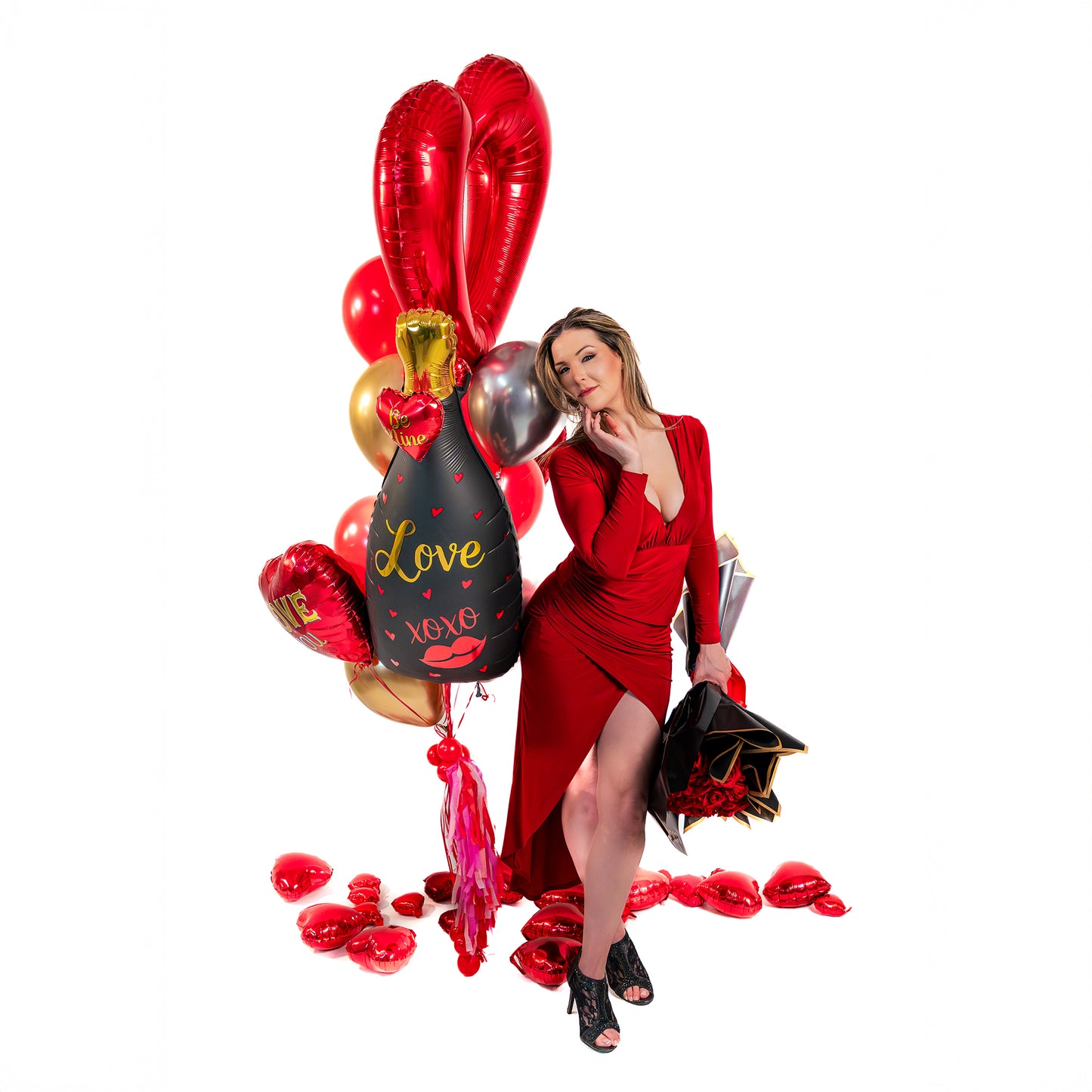 Love XOXO champagne bottle balloon and heart balloons in a Valentine balloon bouquet Toronto