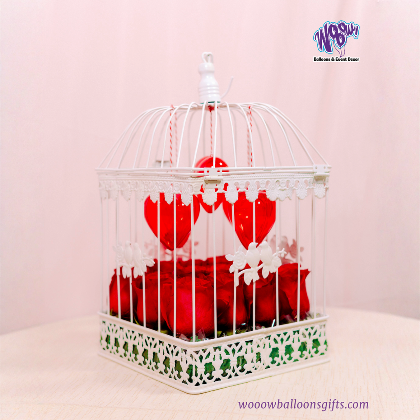 Lovebird Rose Cage with Valentine’s Day roses in Toronto inside a white birdcage