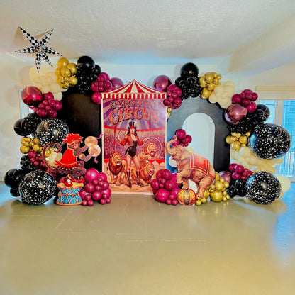uxury circus-themed birthday decoration with custom balloon garlands, animal props and a personalized backdrop in Toronto.