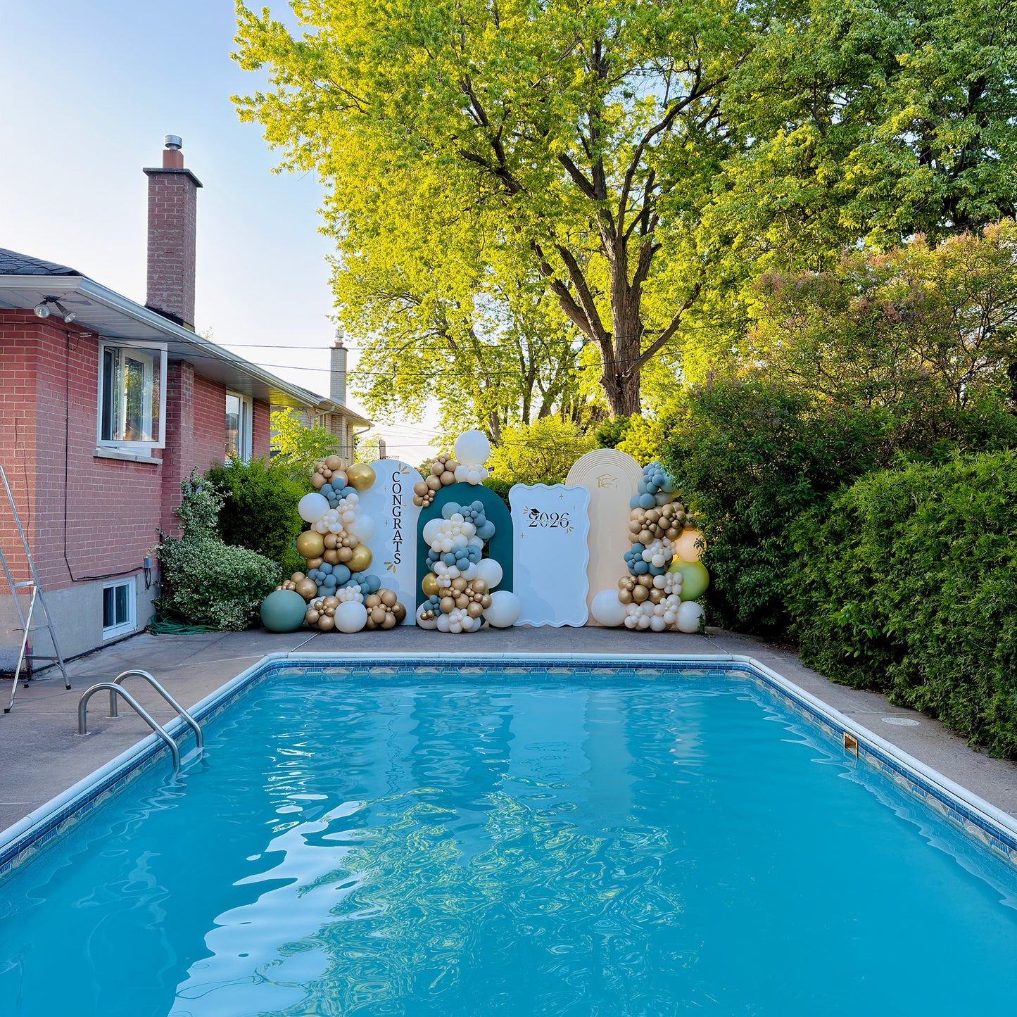 Luxury graduation balloon backdrop setup for outdoor graduation party in Toronto