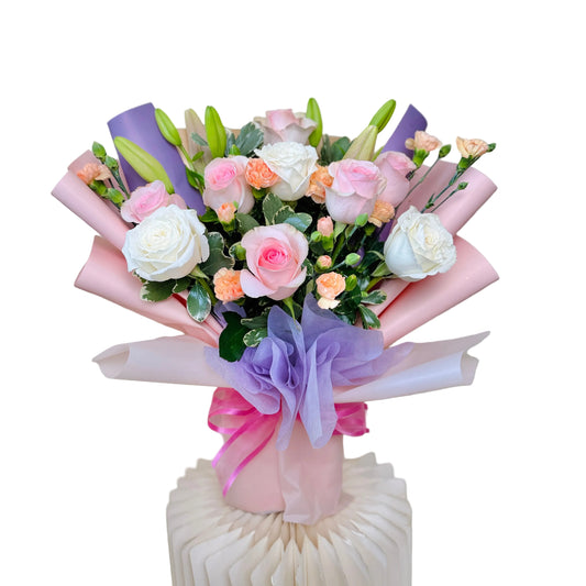 Bright Mother’s Day flower bouquet with orange roses and yellow gerberas in Toronto