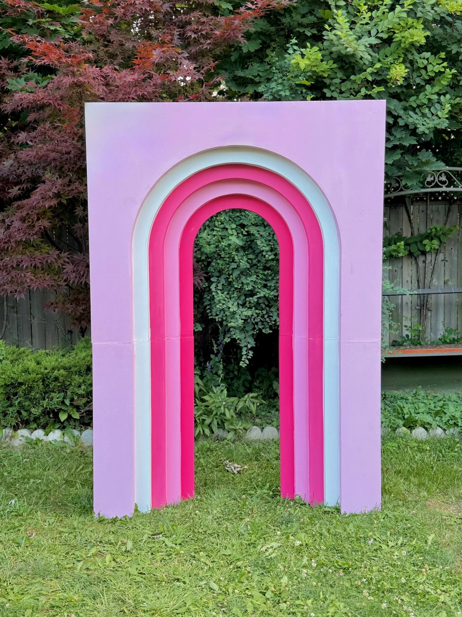 Pastel rainbow arch rental for birthday and event decor in Toronto – Wooow Balloons.