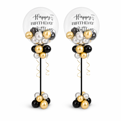 Black, gold and silver personalized balloon centrepieces with custom birthday message in Toronto