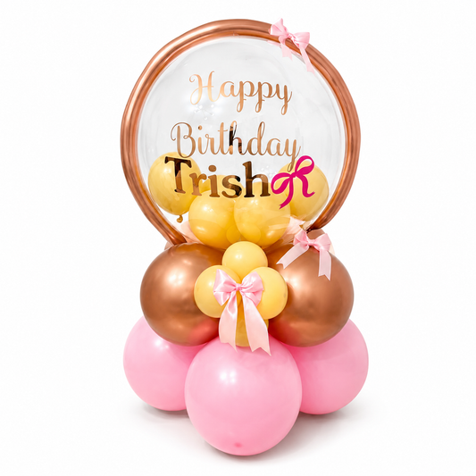 Personalized birthday bubble balloon arrangement with custom name, rose gold, pink, and gold balloons for luxury birthday gifts in Toronto.