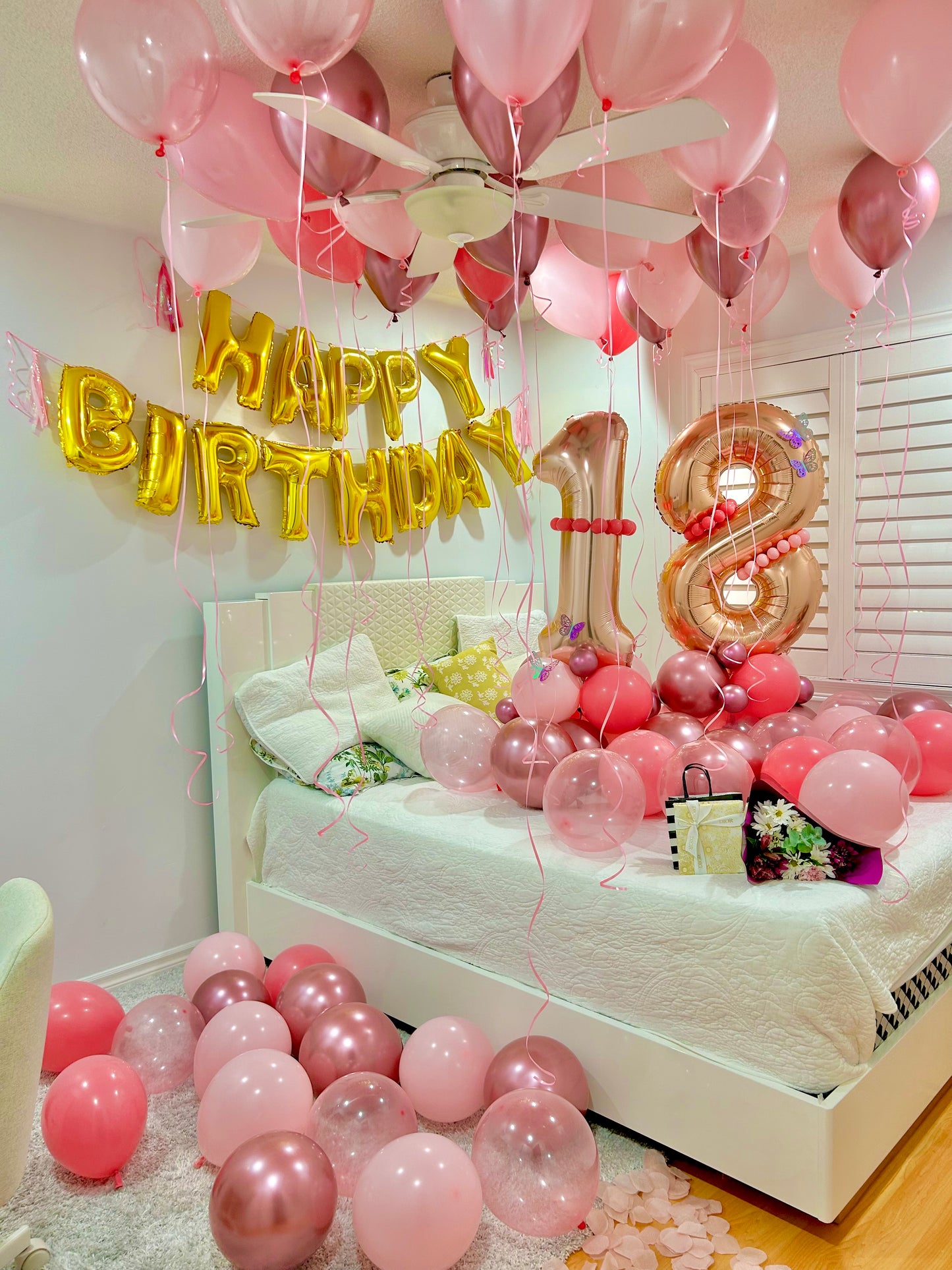 Pink birthday room balloons with helium ceiling balloons, floor balloons and Happy Birthday banner in Toronto