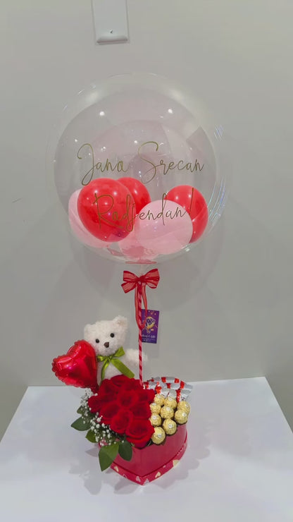 Beautiful Heart Surprise gift set featuring roses, chocolates, a teddy bear, and a bobo balloon with a custom message.