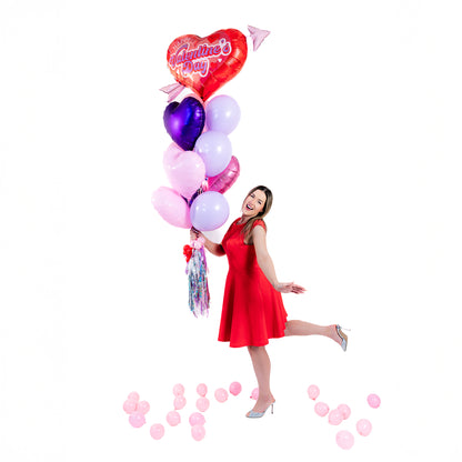 Wooow Balloons holding the Retro Cupid Heart Balloon Bouquet – Valentine's Day balloons Toronto