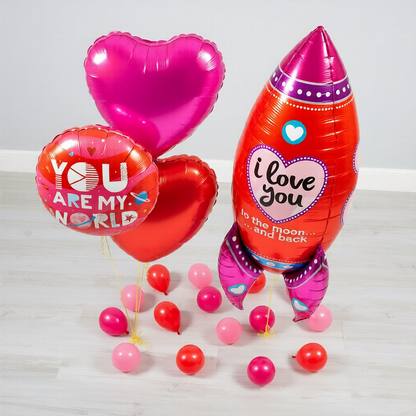 Saint Valentines Balloons Toronto featuring a rocket supershape balloon with romantic heart balloons